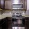 a kitchen with black appliances