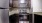 a kitchen with black appliances