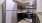 a kitchen with black appliances