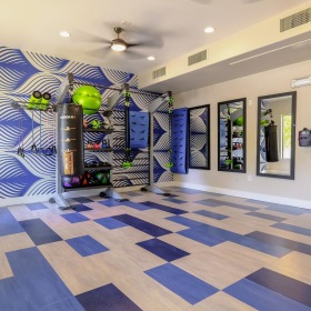 Quick access to state-of-the-art amenities a room with a blue and white checkered floor and a tile floor