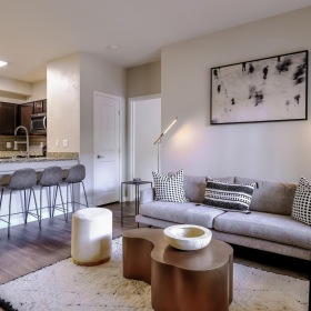 Gorgeous living areas to entertain and enjoy a living room with a couch and a table