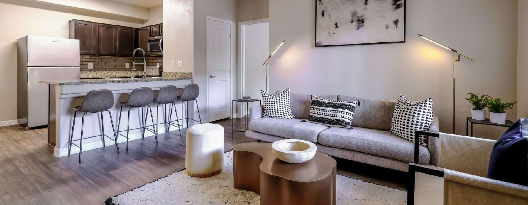 a living room with a couch and a table
