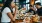 a group of people eating at a restaurant