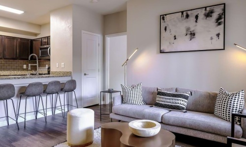 a living room with a couch and a table