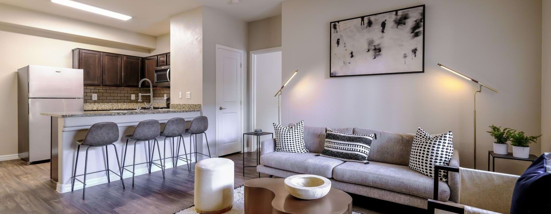 a living room with a couch and a table